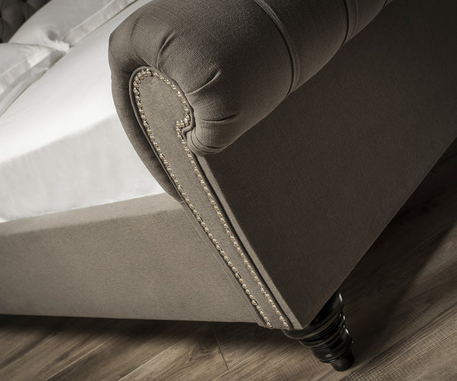 Stanhope Studded Chesterfield Sleigh Bed | Optional Ottoman Storage Bed | The Bed Store