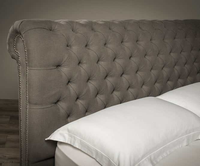Stanhope Studded Chesterfield Sleigh Bed | Optional Ottoman Storage Bed | The Bed Store